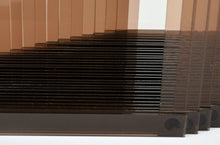 Load image into Gallery viewer, Detail:DeWain Valentine Open Diamond Hyperbolic, American; Glass 18 x 34.50 x 7.25 inches Valentine’s works are semi-transparent, minimalist sculptures that give physical form to light and atmosphere. His works are characterized by sleek surfaces, translucence, and hues that shift in the light. Available at Manolis Projects Gallery, Miami, FL