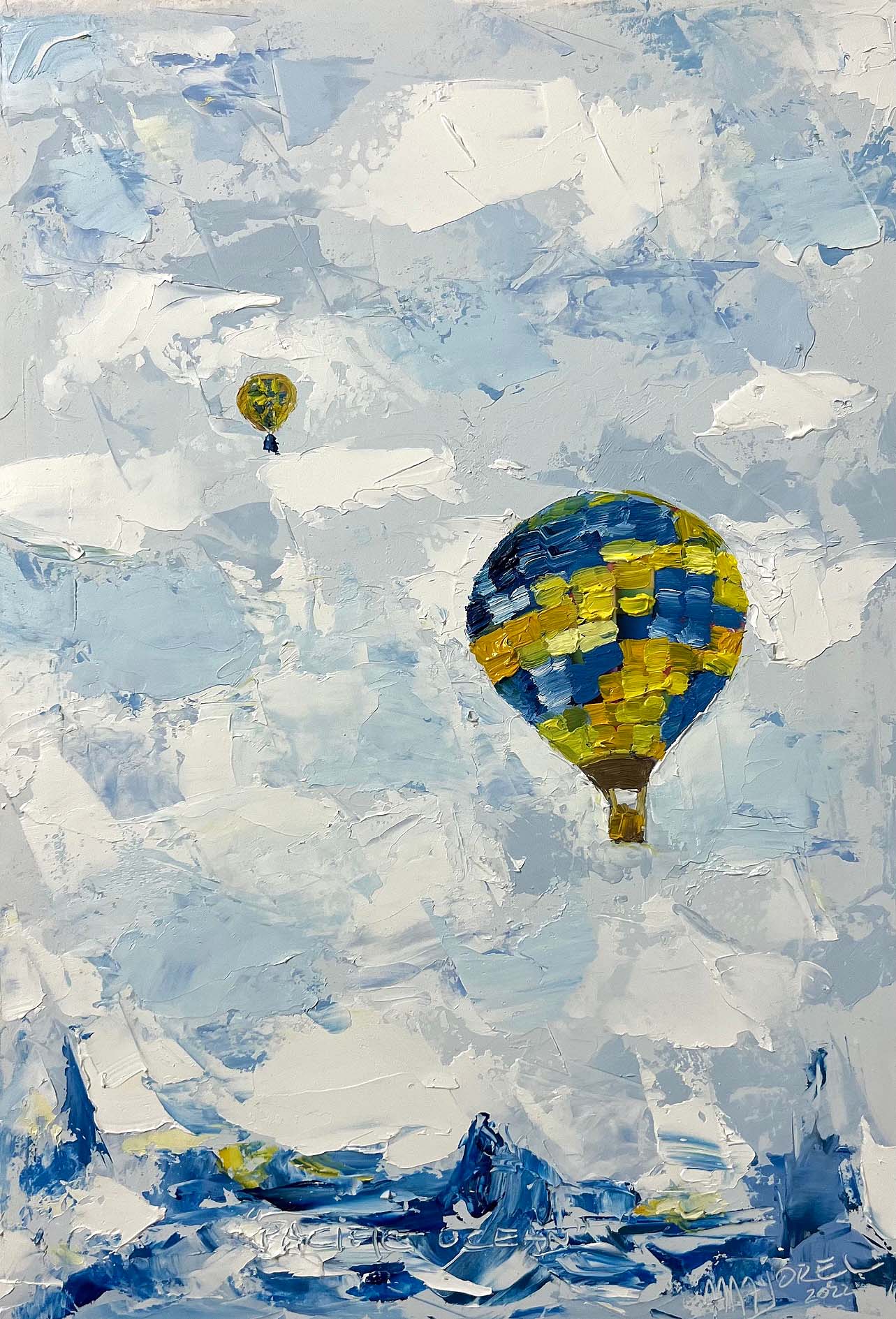 Argentinian artist Aurelia Majorel’s blue and yellow hot air balloon painting “Pacific Ocean,” 2022, Oil on paper, 16 x 12 inches, on display and available at the Ritz Carlton Miami Beach